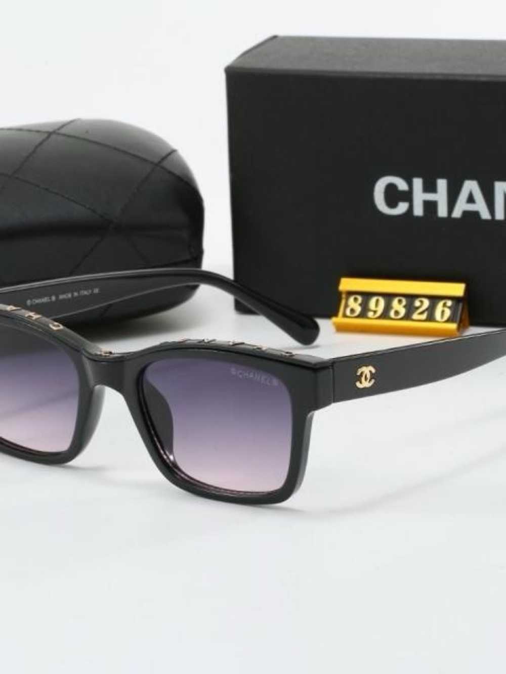 CHANEL Black Sunglasses with Purple Gradient Lenses